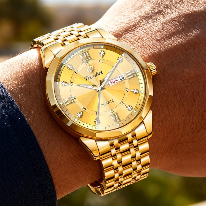 Herrenuhr mit Diamantenbesatz, Kristallglas, Spiegelglanz und goldenem Stahlarmband