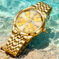 Herrenuhr mit Diamantenbesatz, Kristallglas, Spiegelglanz und goldenem Stahlarmband