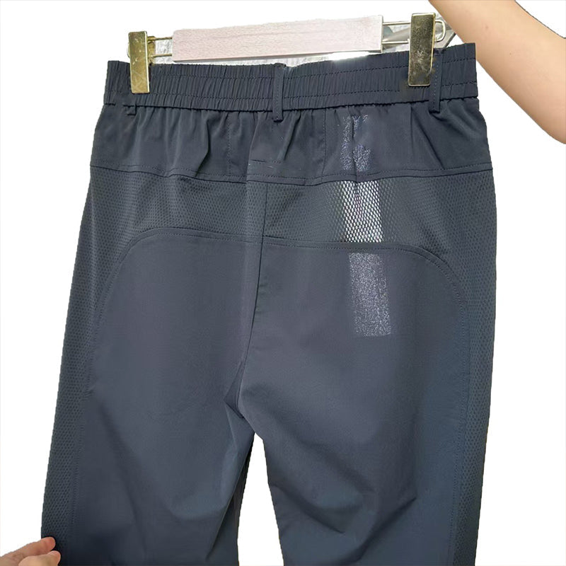 Set aus ultradünnem, atmungsaktivem Mesh-Sport-T-Shirt und langen Hosen