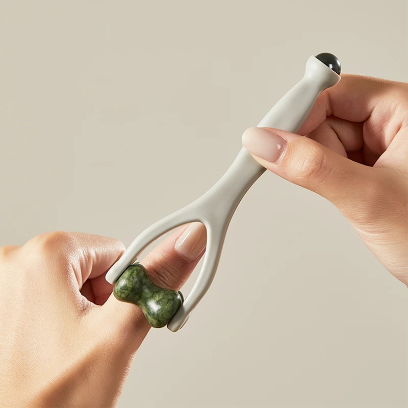 Naturstein-Massageset: Schabbrett, Fingerclip und eiförmiges Massagegerät