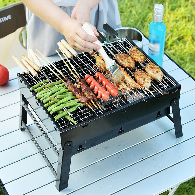 Faltbarer tragbarer Grill mit Schublade und Ständer